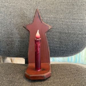 Wall sconce with candle